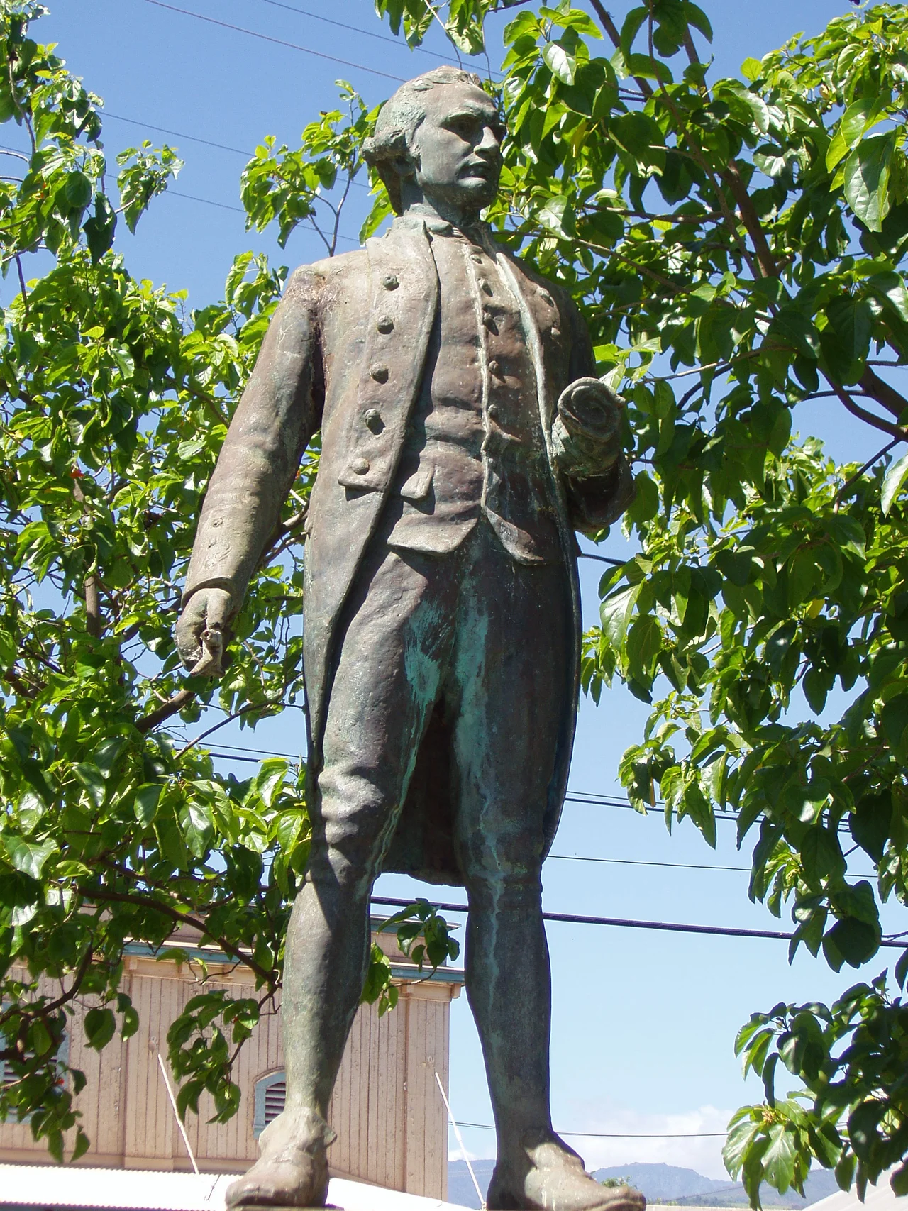 Captain James Cook statue, Waimea, Kauai, Hawaii. According to the legend on its base, this statue is a replica of the original in Whitby, England, made by Sir John Tweed.  Captain Cook's dates are 1728-1779. Rosaleen Parker, 2010-01: I've seen this thousands of times and done research.