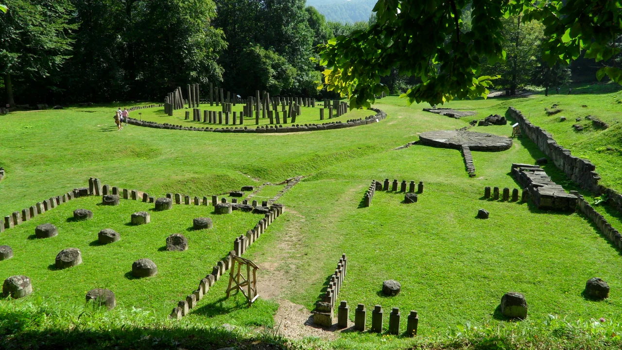 Sarmizegetusa Regia, also Sarmisegetusa, Sarmisegethusa, Sarmisegethuza, Ζαρμιζεγεθούσα (Zarmizegethoúsa) or Ζερμιζεγεθούση (Zermizegethoúsē), was the capital and the most important military, religious and political centre of the Dacians. Erected on top of a 1,200 metre high mountain, the fortress was the core of the strategic defensive system in the Orăştie Mountains (in present-day Romania), comprising six citadels. Sarmizegetusa Regia was the capital of Dacia prior to the wars with the Roman Empire.